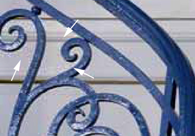 Image example of Mosquito Noise (Temporal) around curved railings on a hand rail.
