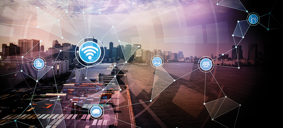 Smart city network concept over waterfront skyline with IoT connectivity icons, wireless communication and digital infrastructure technology background