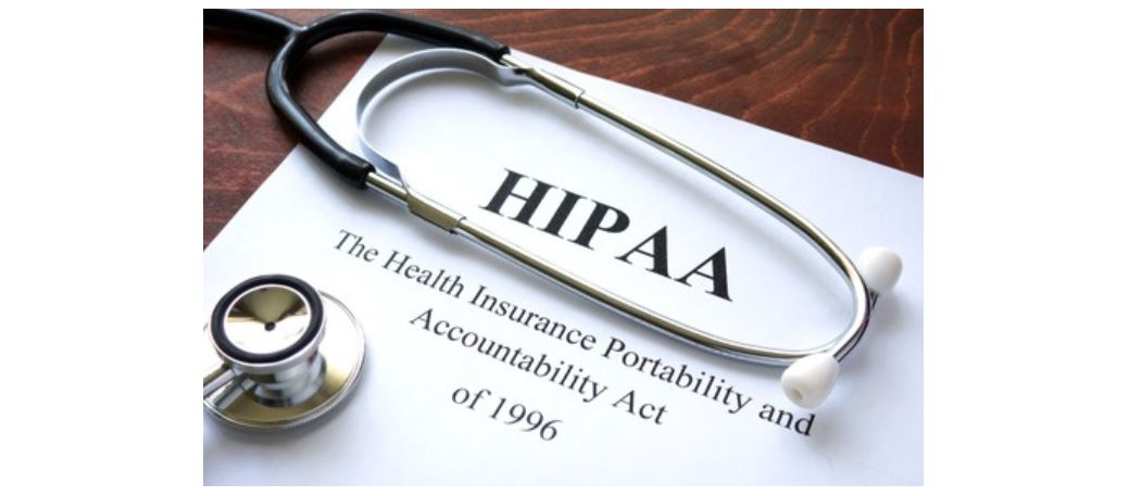 Stethoscope on HIPAA compliance document, Health Insurance Portability and Accountability Act information for healthcare privacy protection