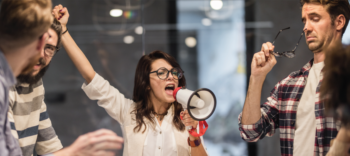 Woman shouting through megaphone during heated office meeting, coworkers reacting in modern workplace, showing conflict and loud noise distraction