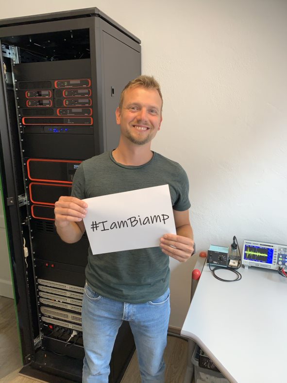 Image of Marco Hendel, Applications Engineer holding a sign that says #IamBiamp