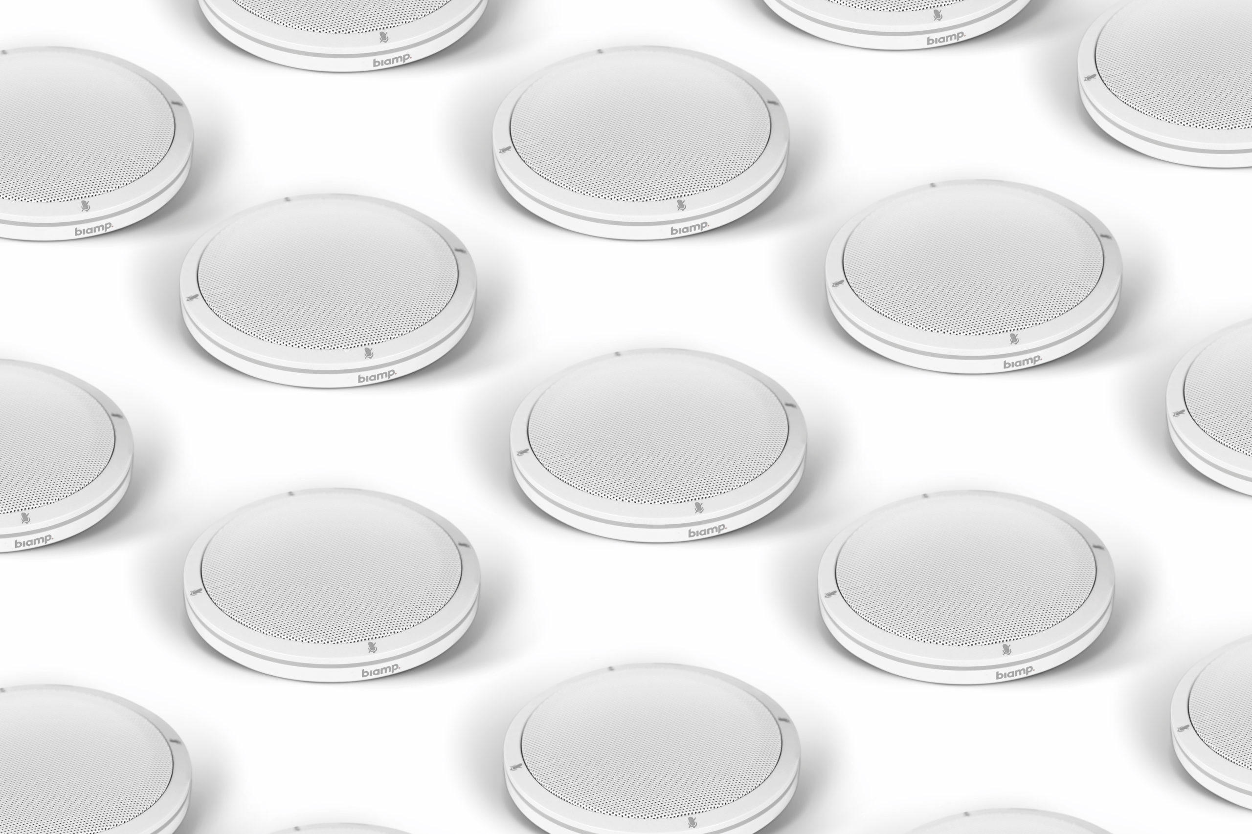 Pattern of Biamp ceiling speakers on white background, commercial audio installation concept for offices, classrooms and conference rooms.