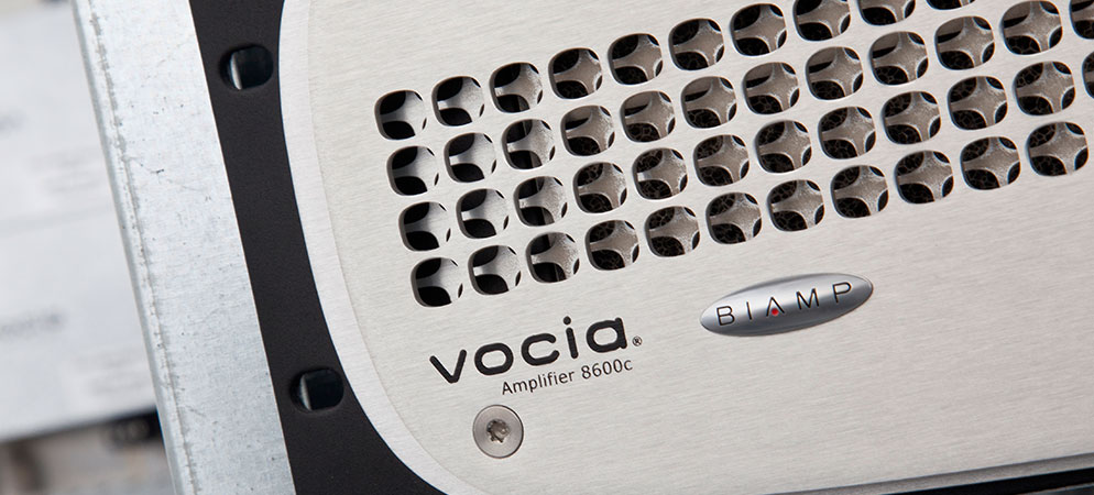 Biamp Vocia amplifier 8600c close-up in rack, commercial paging and background music amplification hardware for AV systems