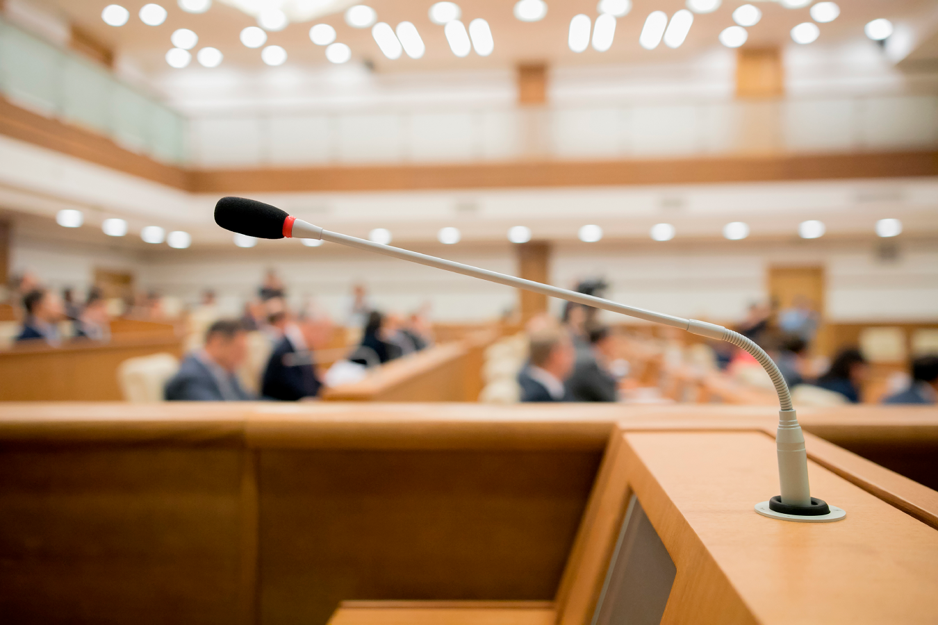 Courtroom with a long neck mic in the foreground