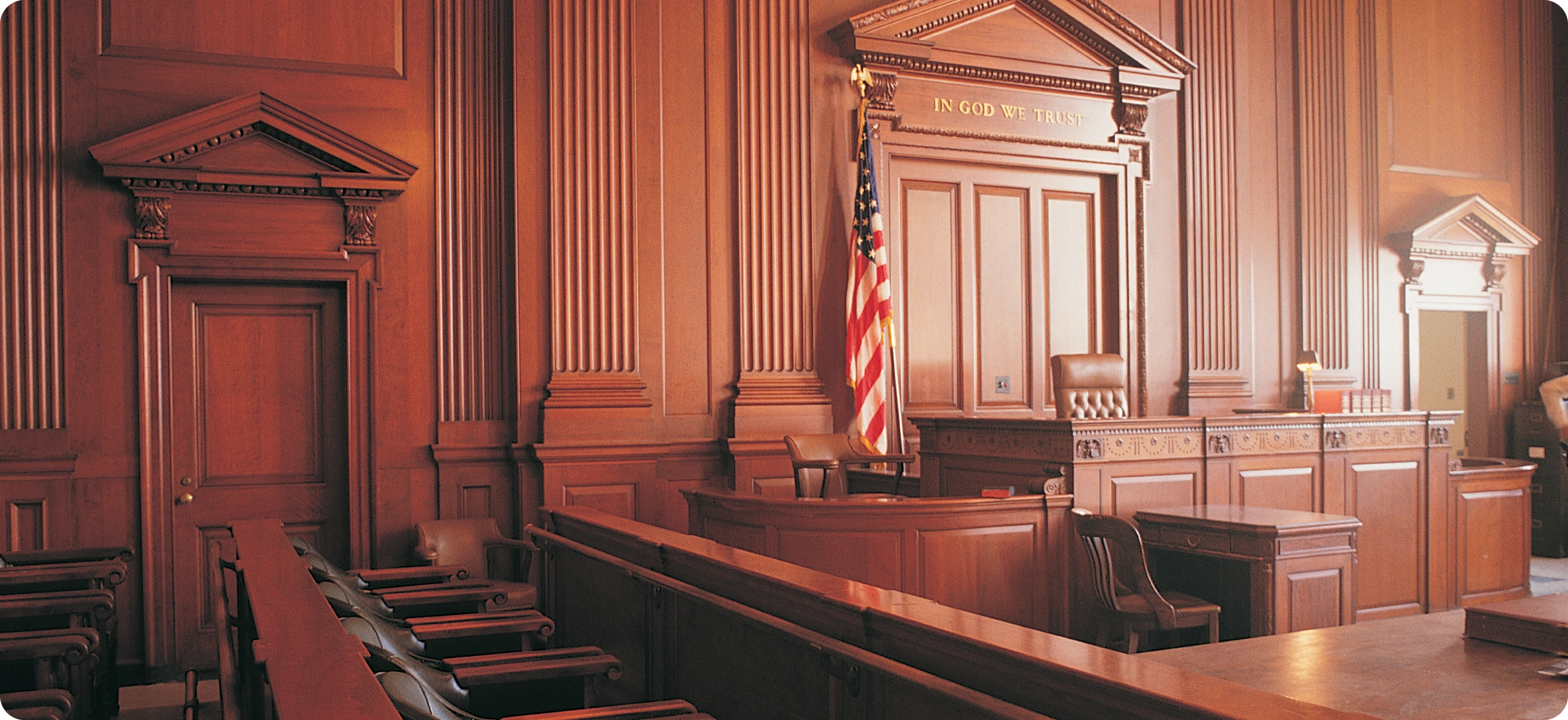 Courtroom with wood paneling.