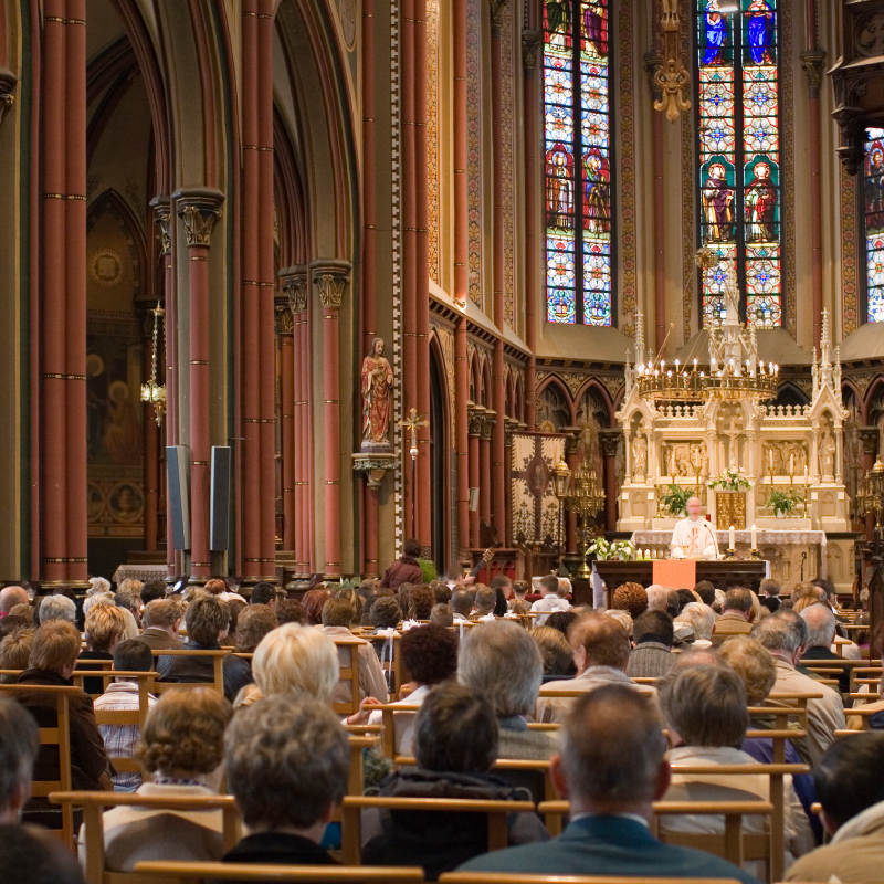 A crowded traditional worship space