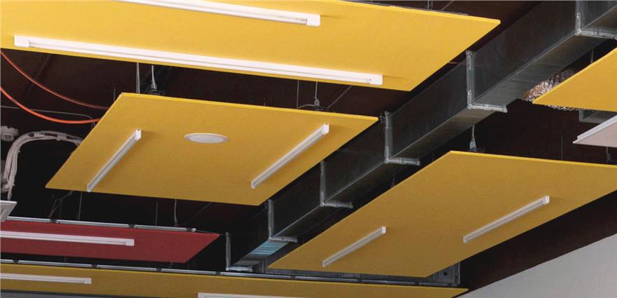 Ceiling with suspended yellow and red acoustic panels, fluorescent lights, and exposed ductwork.