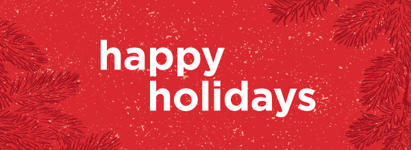 Red festive holiday banner with pine branches and white “happy holidays” greeting text
