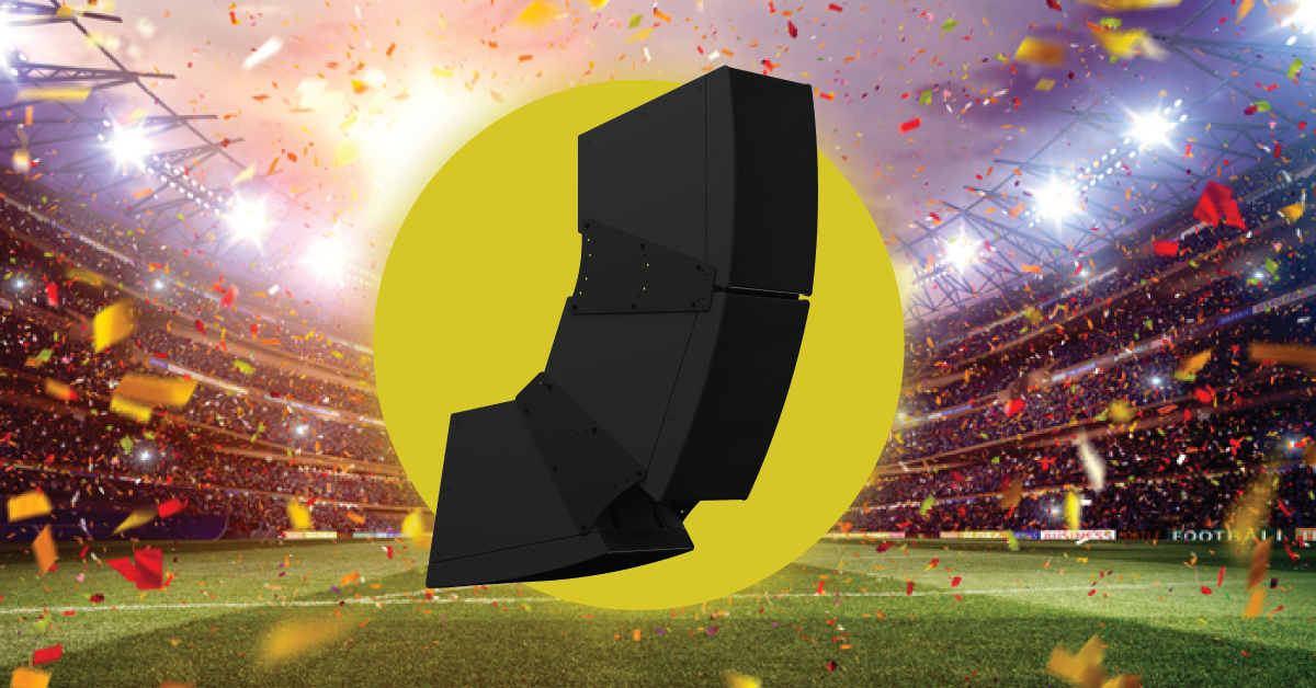 Stadium line array speaker system with black loudspeakers and confetti under bright arena lights