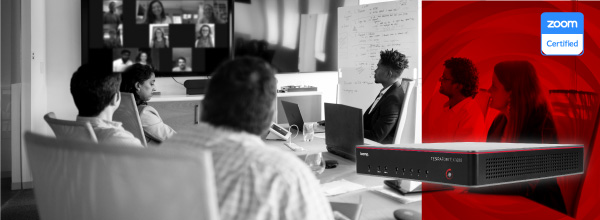 Hybrid conference room using Zoom video with Biamp TesiraFORTÉ X processor highlighted, promoting Zoom Certified audio for modern meetings.
