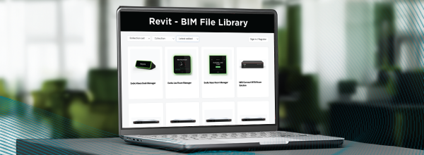 Laptop displaying Biamp Revit BIM File Library interface, highlighting downloadable 3D models for integrating AV devices into building designs.