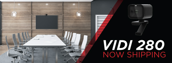 Vidi 280 PTZ conference camera product banner showing modern boardroom setup with text announcing the Vidi 280 is now shipping.