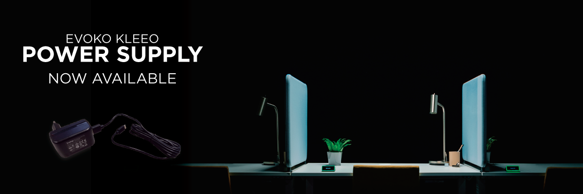 Evoko Kleeo power supply now available banner featuring desktop occupancy indicators on modern workstations in a dark office setting.