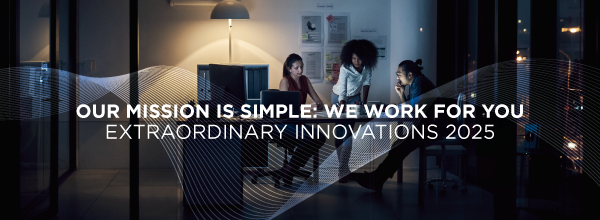 Nighttime office scene with diverse team collaborating, overlaid with text “Our Mission Is Simple: We Work For You – Extraordinary Innovations 2025.”