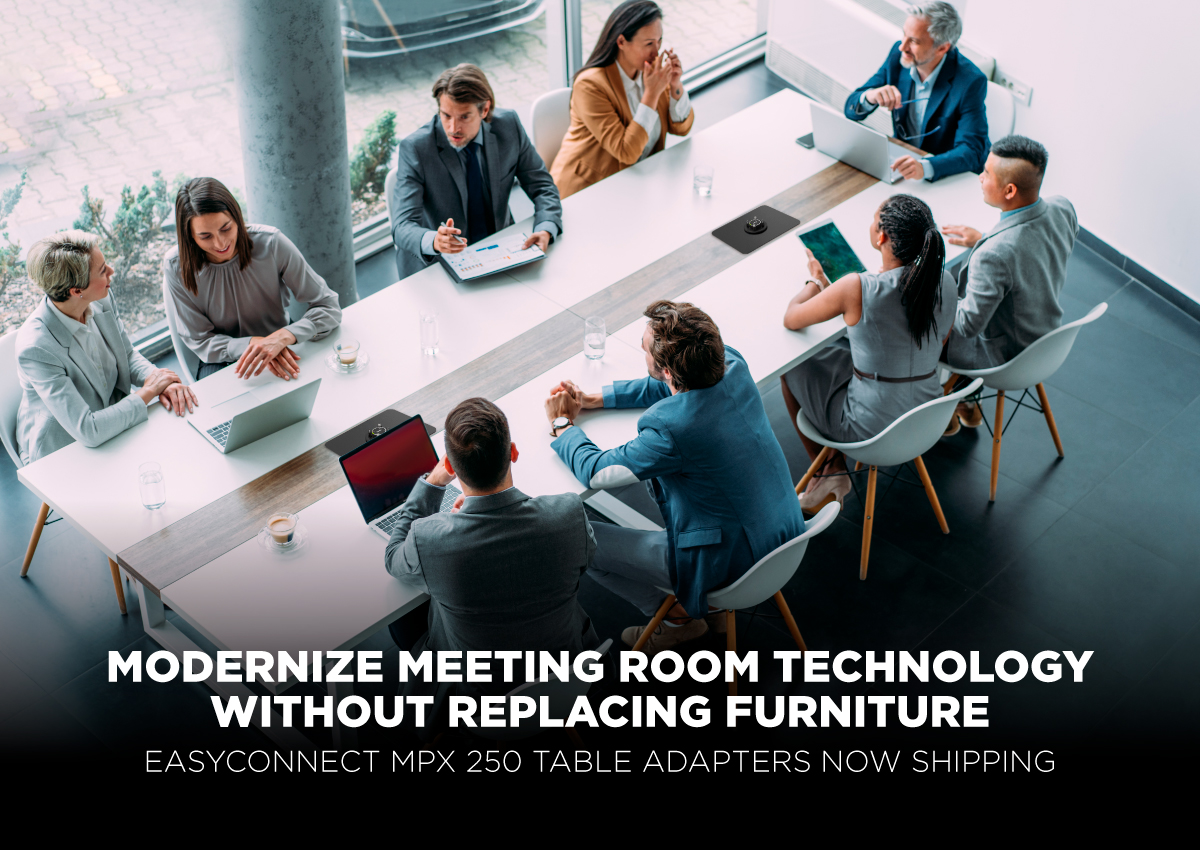 Team meeting in modern conference room with EasyConnect MPX 250 table adapters, modernizing meeting room technology without replacing furniture