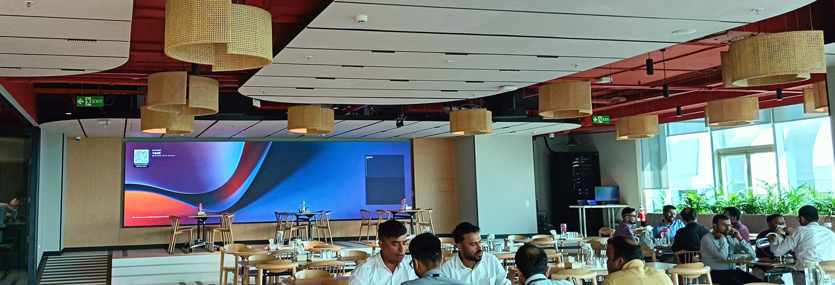 group of people sitting in cafeteria