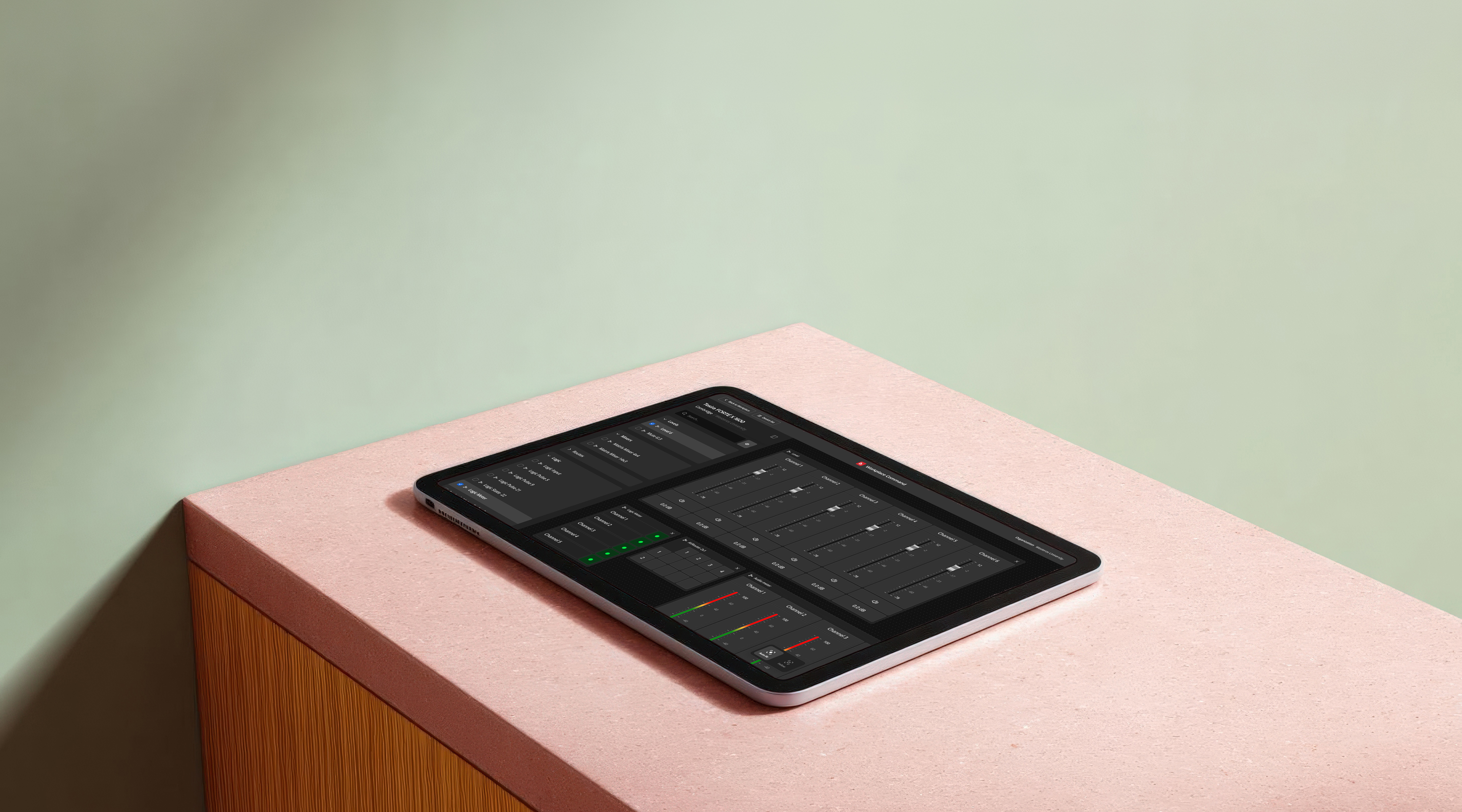 Tablet sitting on a table displaying Biamp Workplace Command
